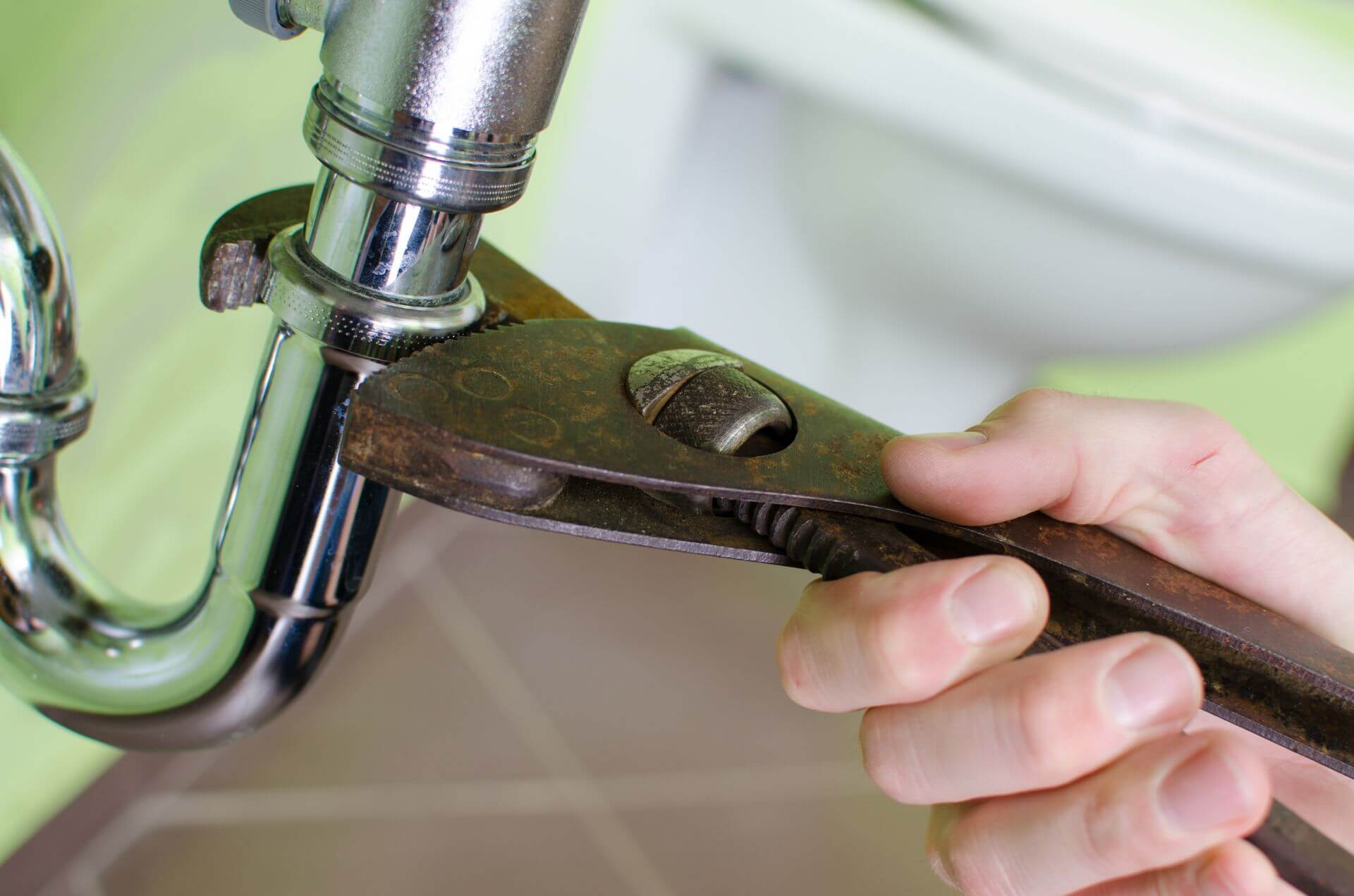 Hands-on plumbing work — image from their website